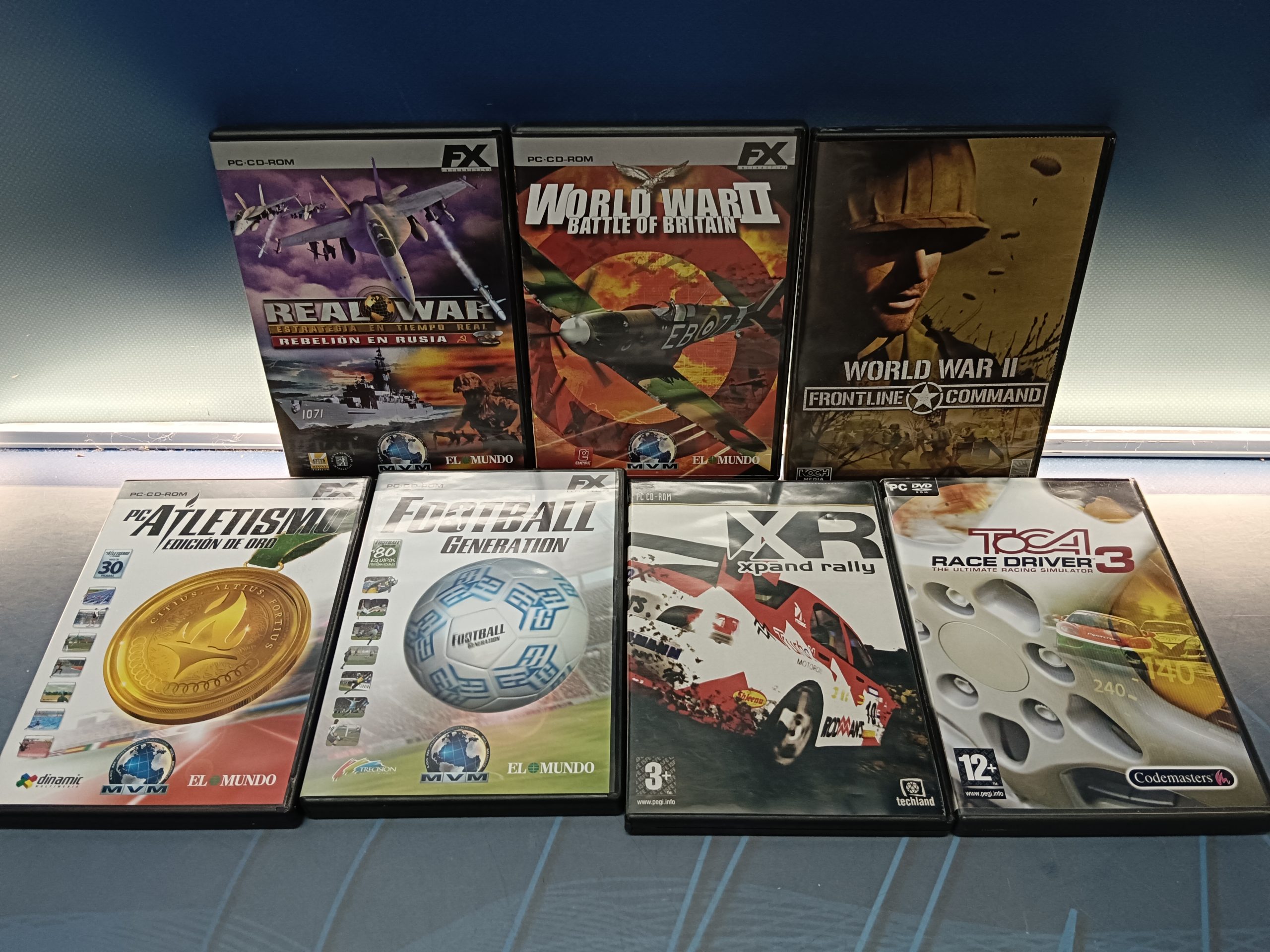 Lote 7 videojuegos PC, Belicos, de carreras y deportivos