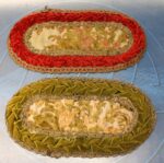 2 tapetes ovalados de brocado y terciopelo.