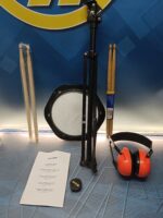 Pad de prácticas con soporte + par de baquetas y protector auditivo