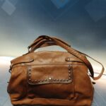 Bolso de piel marrón en perfecto estado sin taras