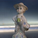 14. Joven floricultor de porcelana Sanbo.
