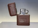 05. Zippo vintage con funda de cuero Pepsi, F - IX. 1993.