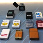 11 mecheros de gasolina, tipo Zippo, publicidad bebidas. Años 90.