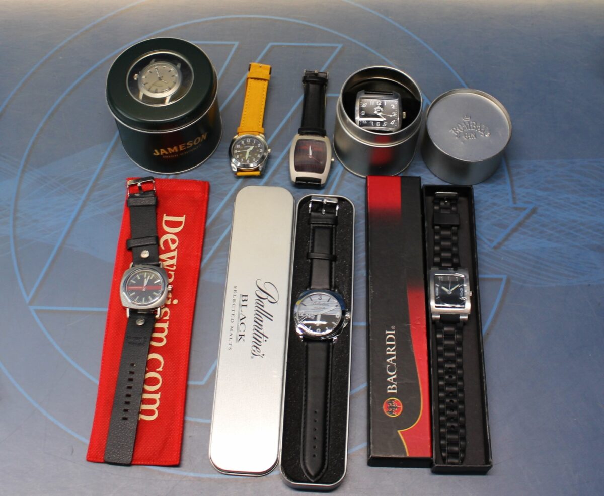 IMG_0539 7 relojes de pulsera publicidad bebidas. - Imagen 1